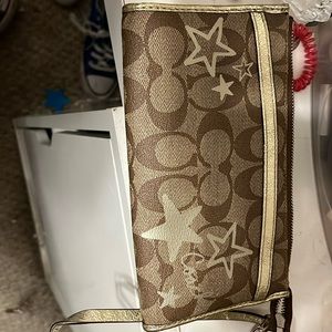 Coach Poppy Brown and Gold Star wristlet